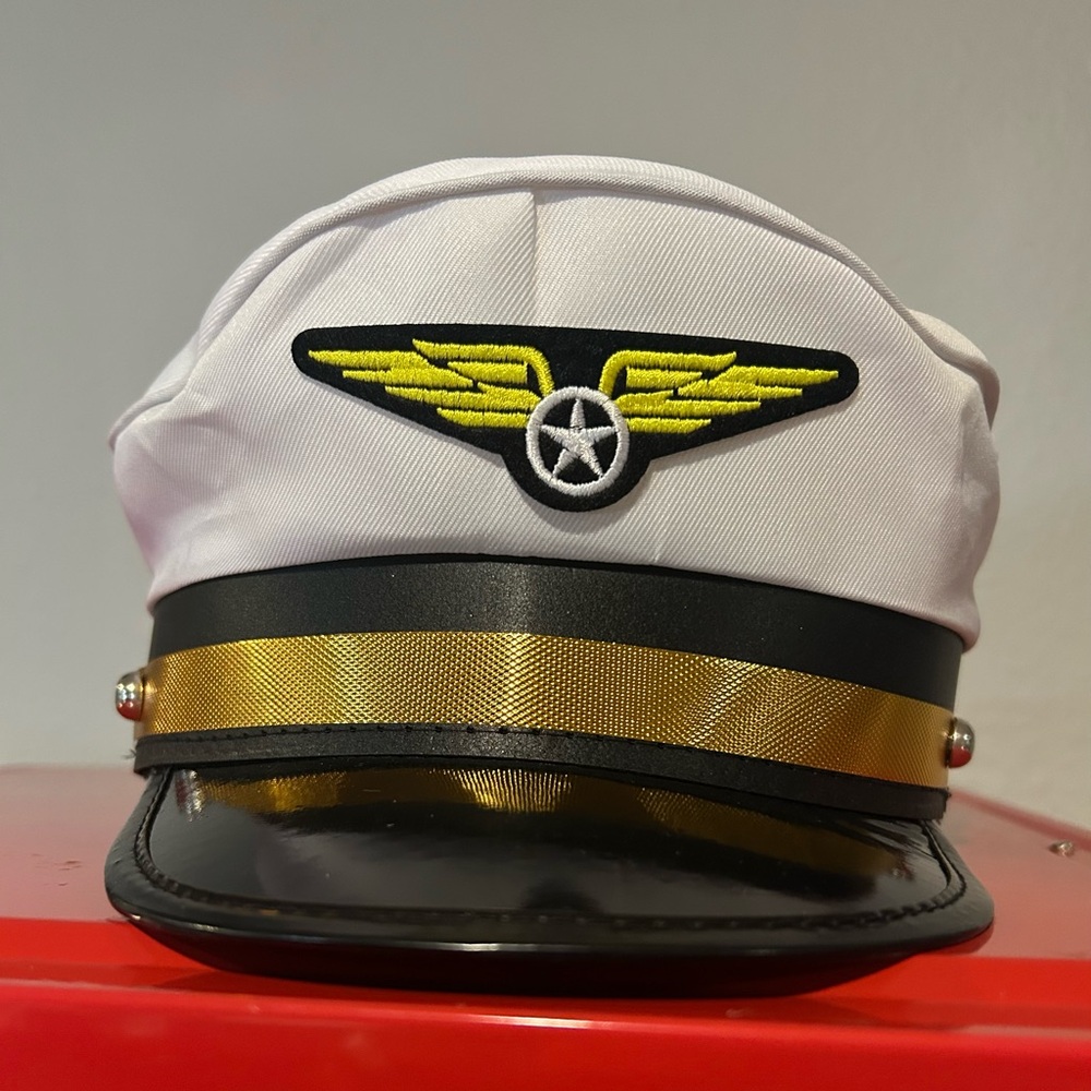 White and Black Captain Hat with Gold and Yellow Accents